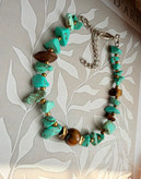 دستبند فیروزه وچشم ببر